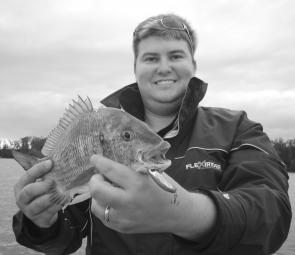 Josh Padmos with a great bream taken on the surface. Bream like these are around throughout the Christmas period and casting poppers is becoming a popular way to catch them.